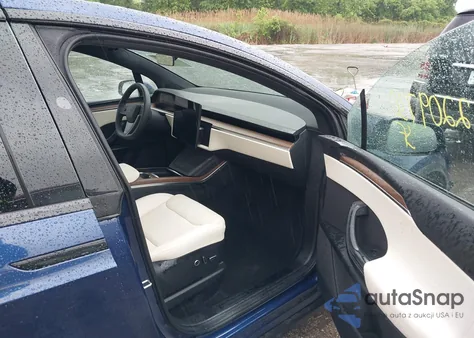 2023 Tesla Model X Dual Motor All-Wheel Drive/Standard Range from USA, damaged, VIN 7SAXCDE59PF413874